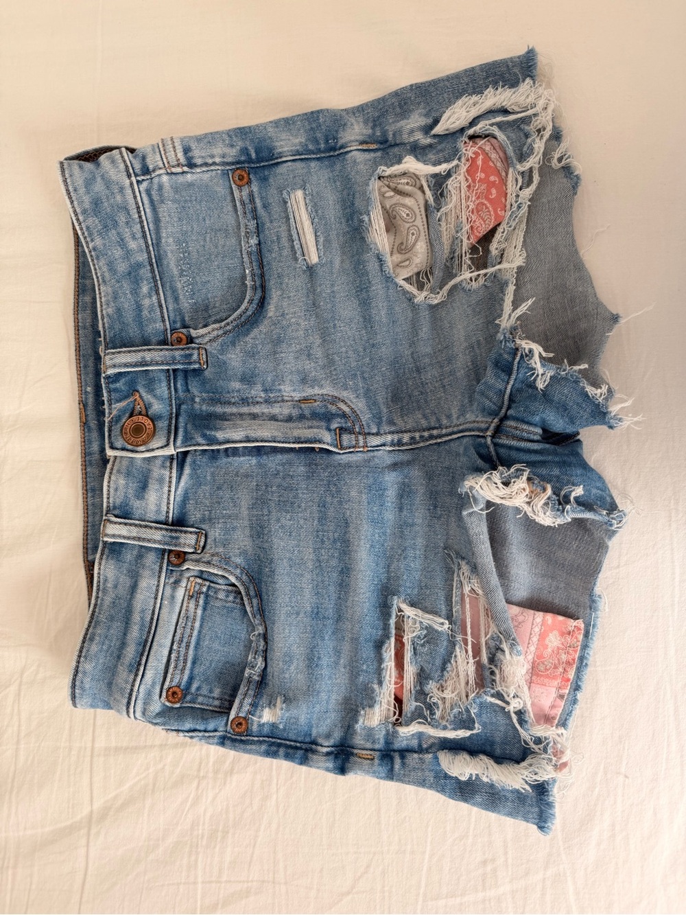 Distressed Light Blue Denim Women’s Shorts with Bandana Patches